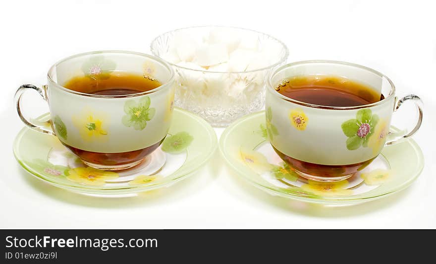 Two Tea Cups On A Saucer