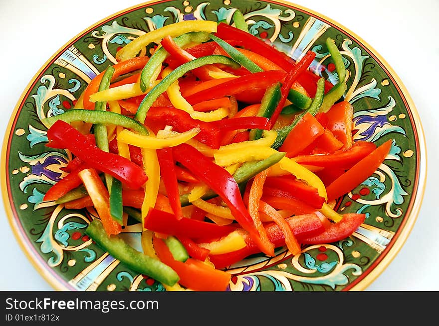 Colorful sliced pepper stir-fry on plate. Colorful sliced pepper stir-fry on plate