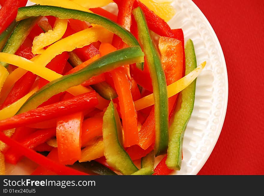 Colorful sliced pepper stir-fry on plate. Colorful sliced pepper stir-fry on plate