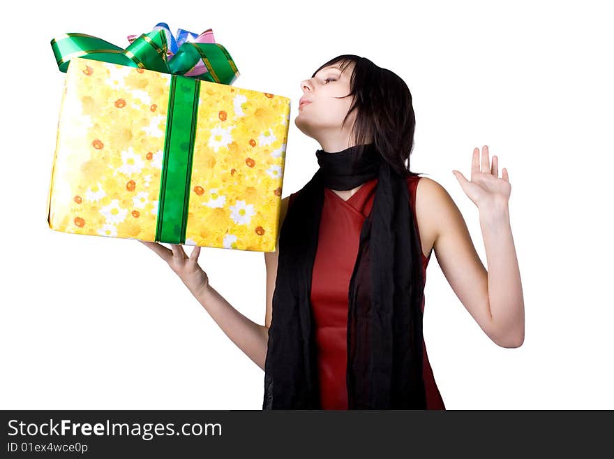 The young beautiful girl with purchases in colour packages during shopping on a white background