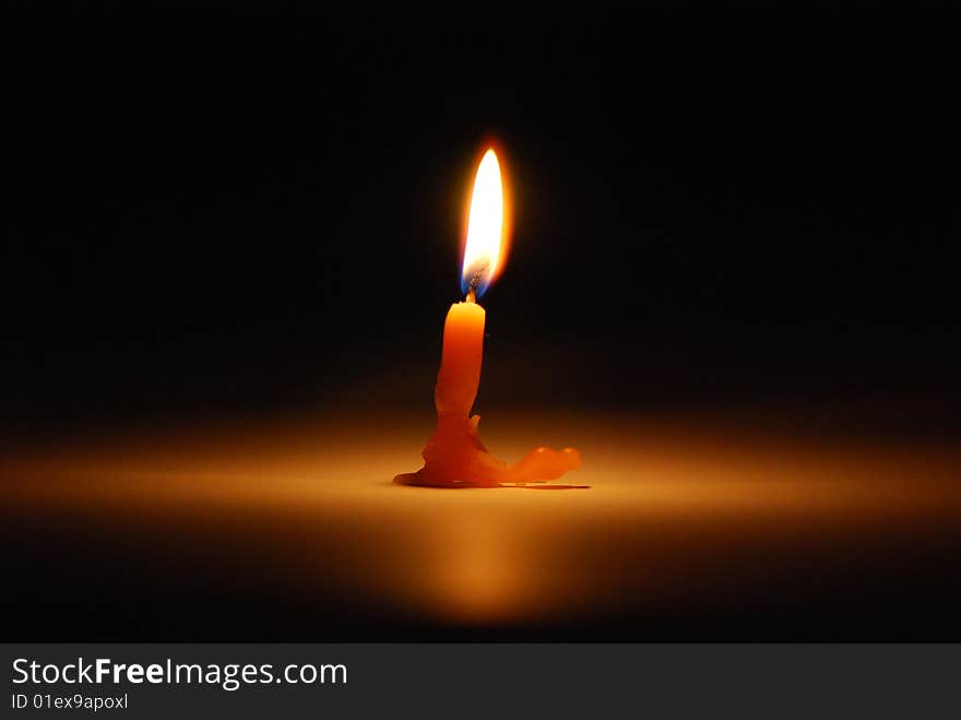 The bright candle disperses darkness