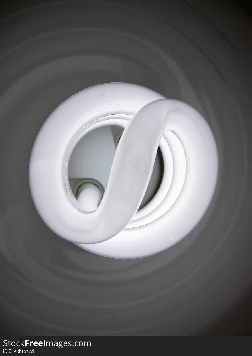 Close up of fluorescent energy saving bulb. Close up of fluorescent energy saving bulb.