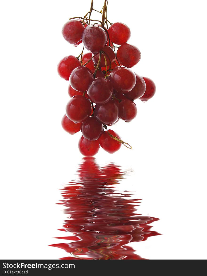 A bunch of red grapes isolated on white background