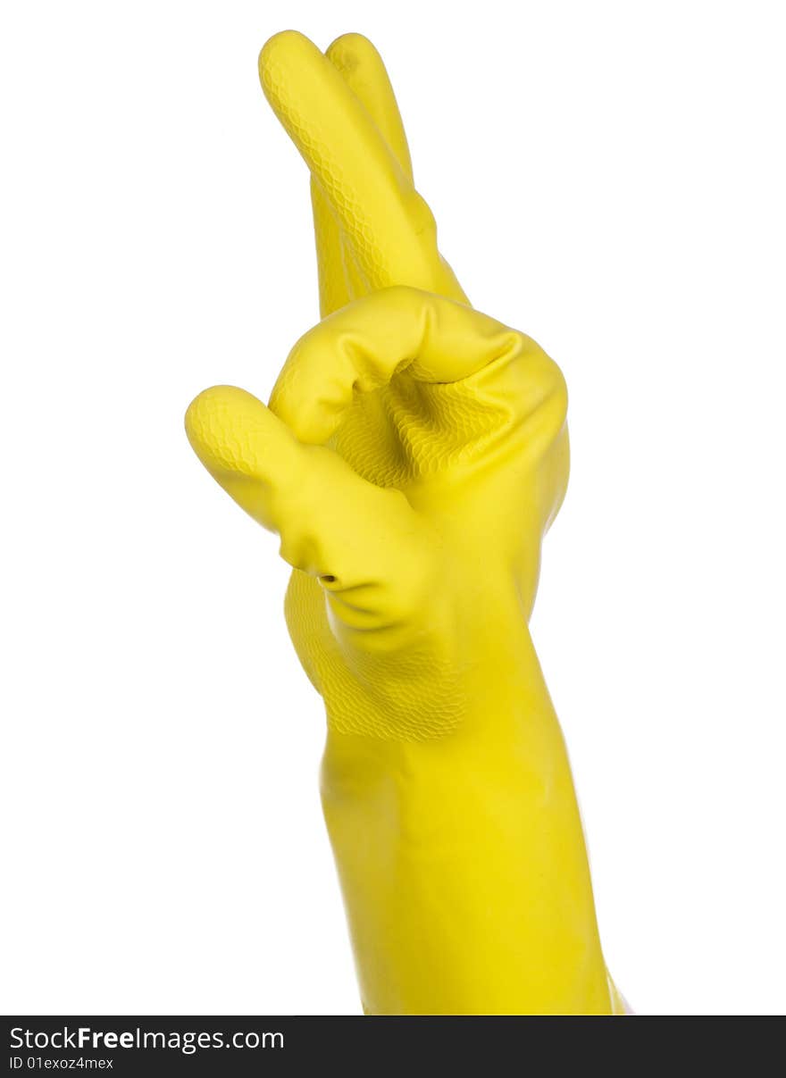 A hand in a yellow rubber glove giving the OK sign