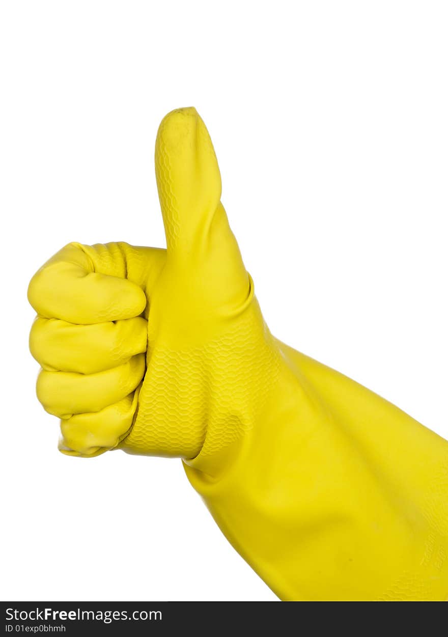 A hand in a yellow rubber glove giving the Thumbs up sign