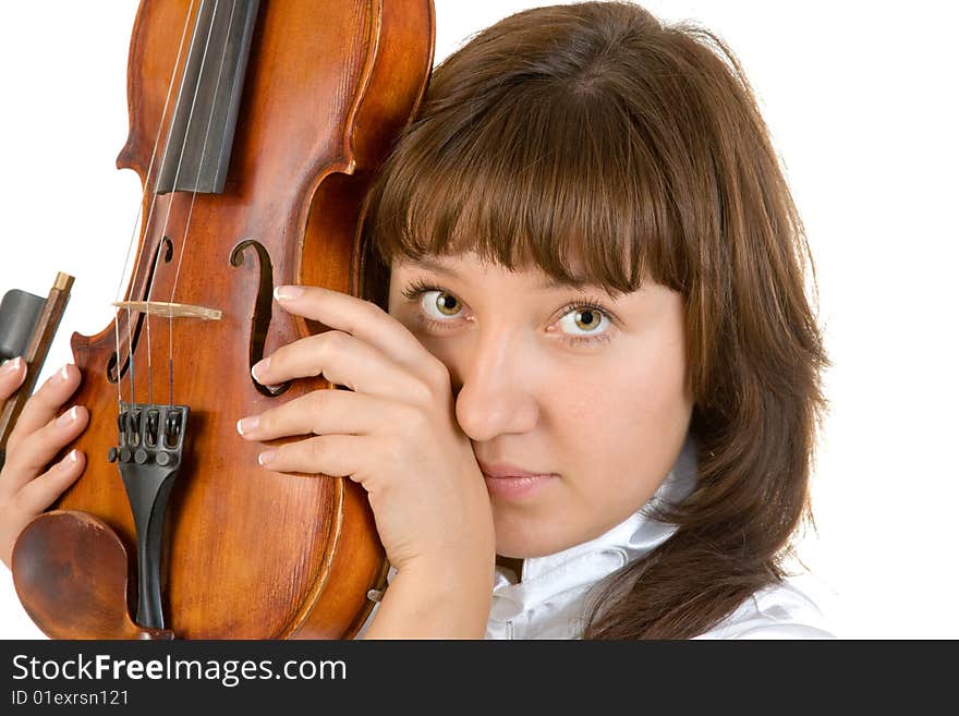 Girl in white blouse holding violin isolated over white. Girl in white blouse holding violin isolated over white