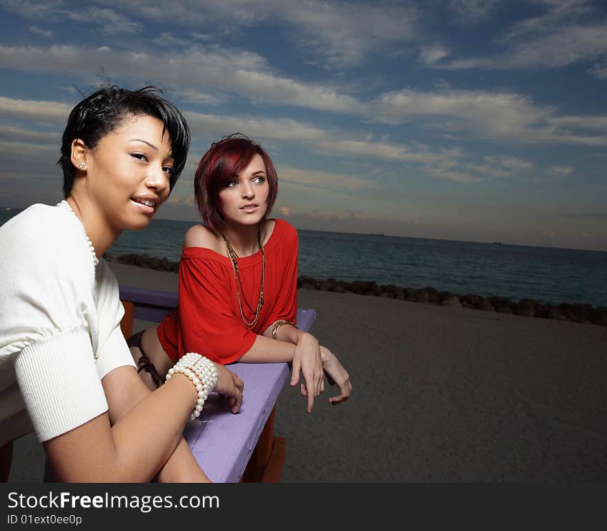 Two beautiful young women on the beach. Two beautiful young women on the beach