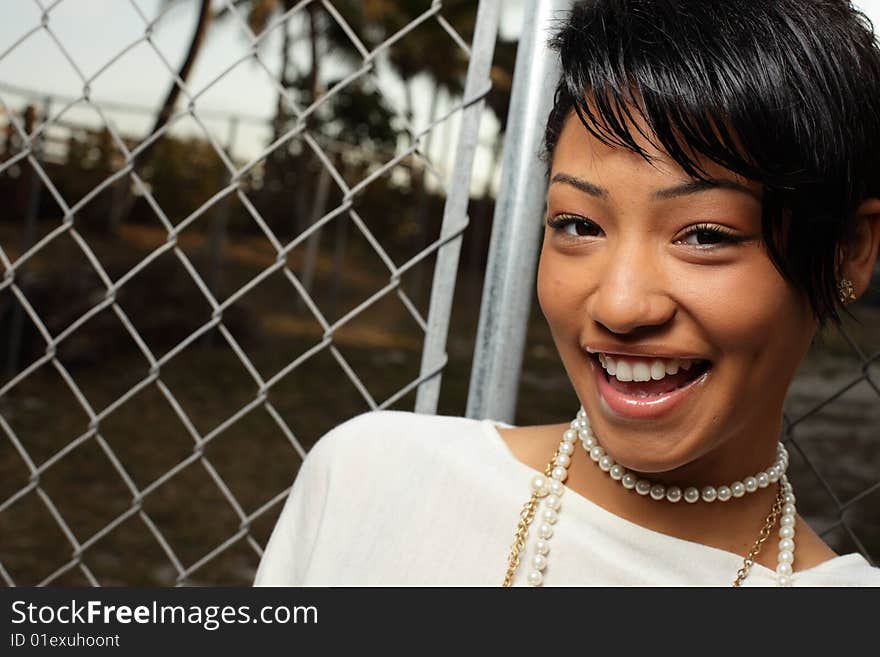 Beautiful young woman smiling at the camera