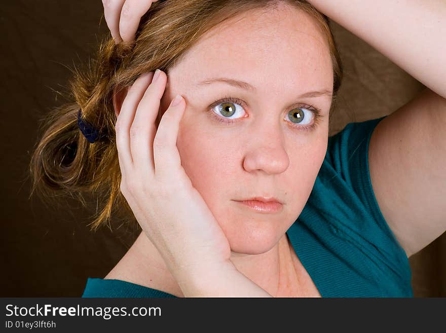 Beautiful image of a woman with large green eyes.