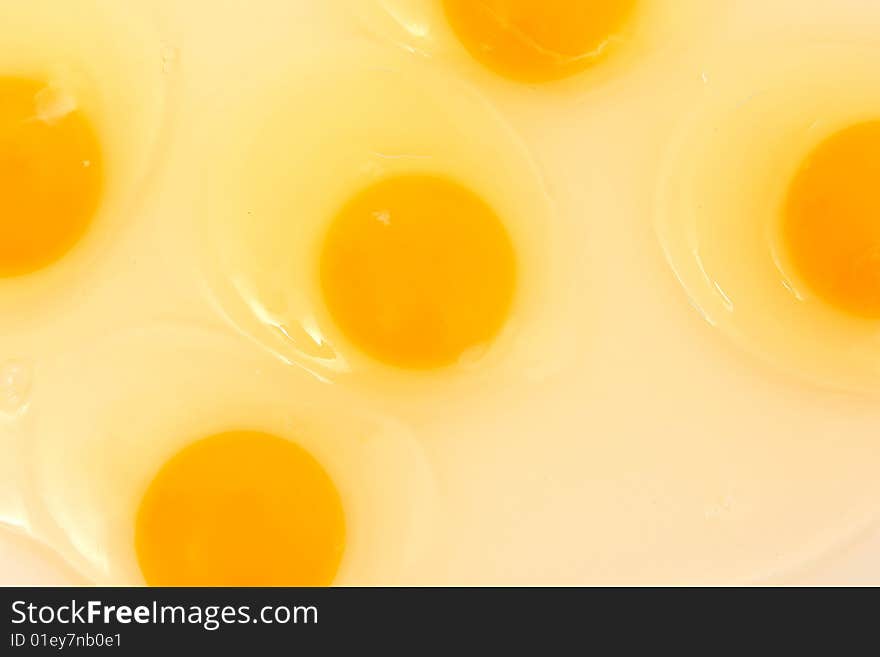 Raw chicken egg background close up. Raw chicken egg background close up.