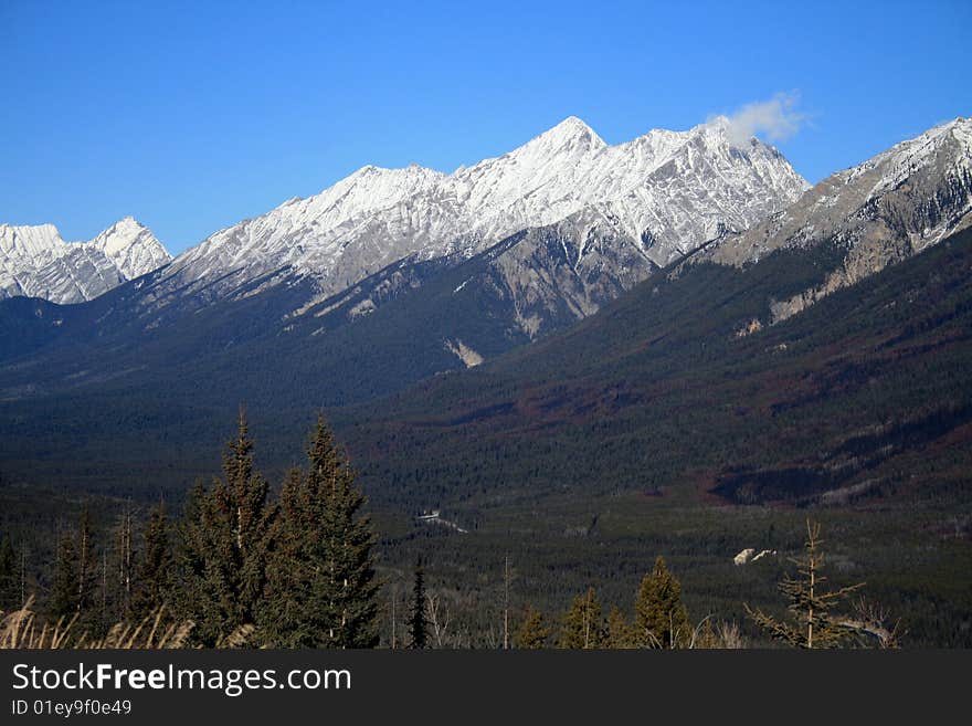 View of Canadian Rocky Mountains with snow on peaks. View of Canadian Rocky Mountains with snow on peaks