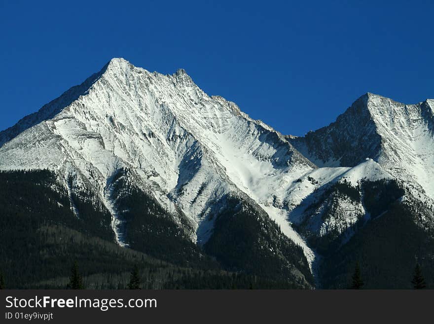 View of Canadian Rocky Mountains with snow on peaks. View of Canadian Rocky Mountains with snow on peaks