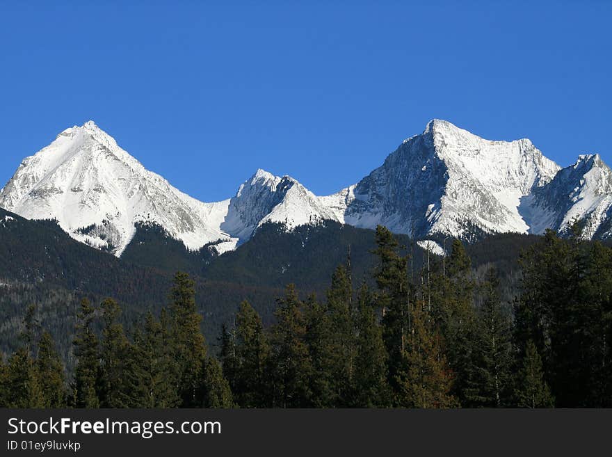 View of Canadian Rocky Mountains with snow on peaks. View of Canadian Rocky Mountains with snow on peaks