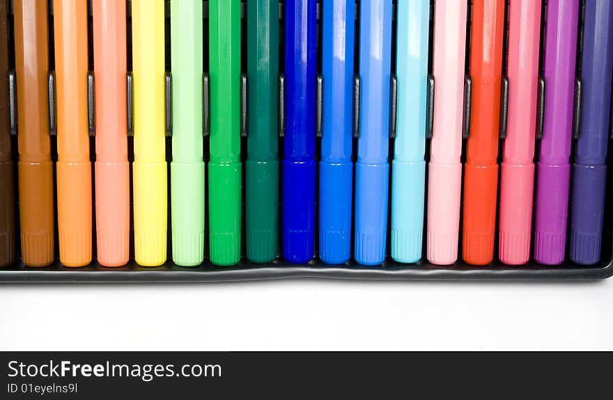 Many closed felt-tip pens, pastel and dark colors