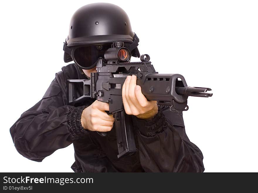 One soldier with the gun in the hands on a white background. One soldier with the gun in the hands on a white background