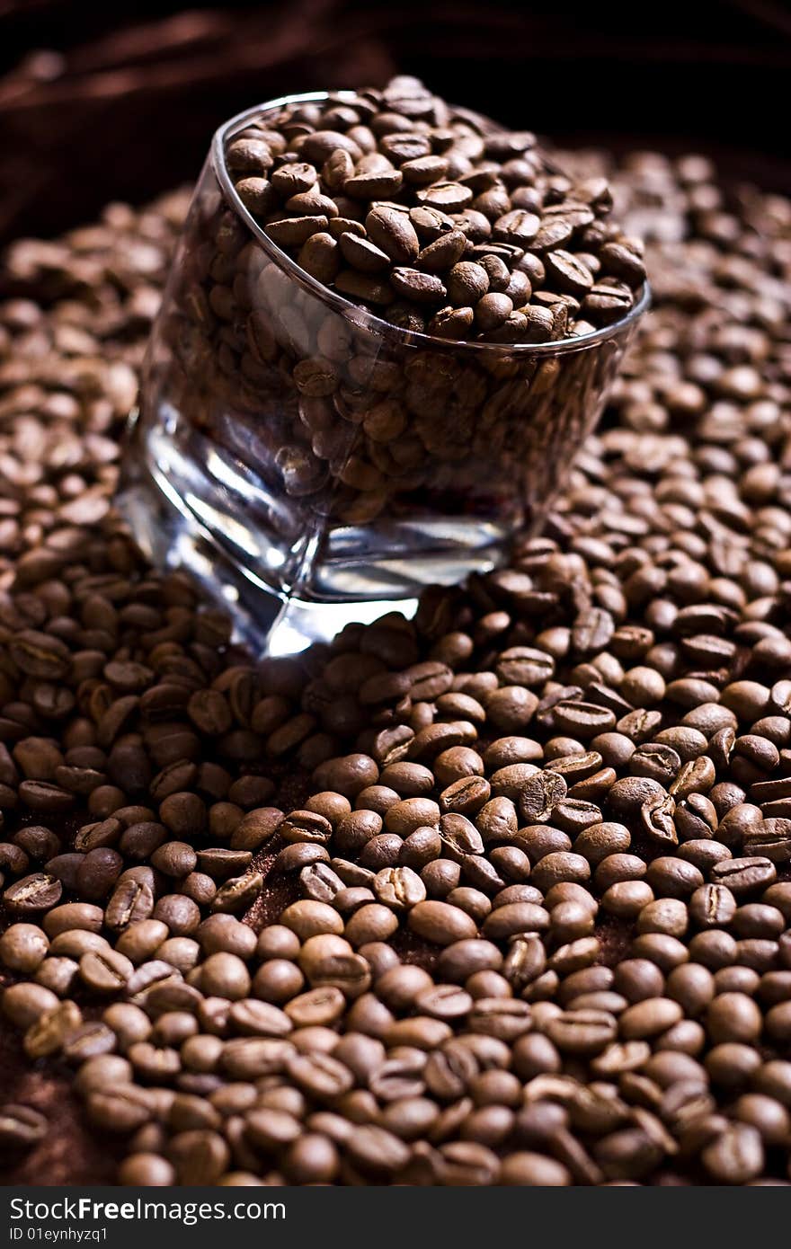 Glass full of coffee beans. Glass full of coffee beans