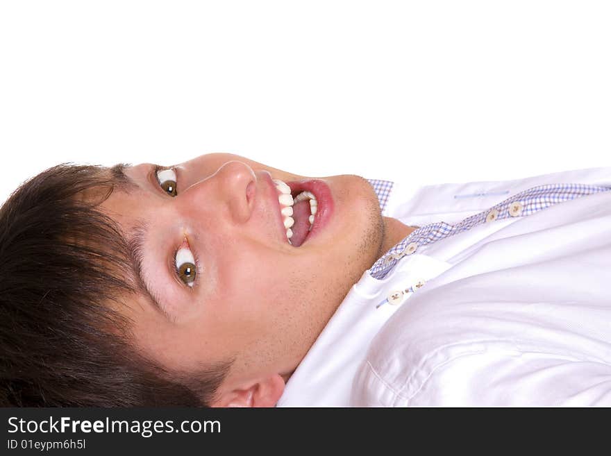 Portrait of a handsome Caucasian male in astonishment. Isolated over white