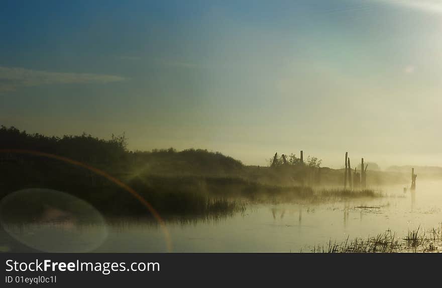 Foggy morning on small lake. Foggy morning on small lake