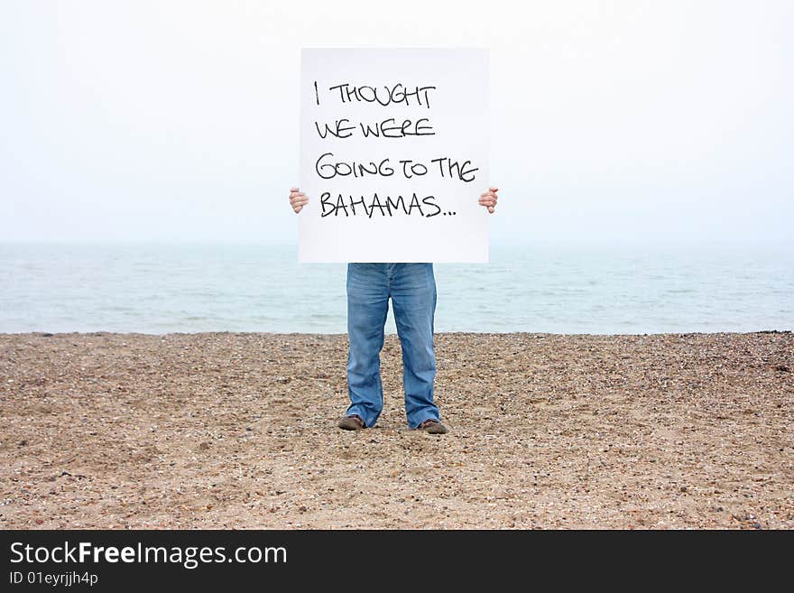 Uk holiday man on winters beach