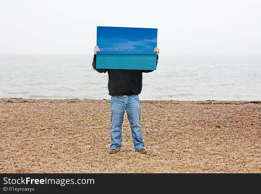 Man holding blue sky