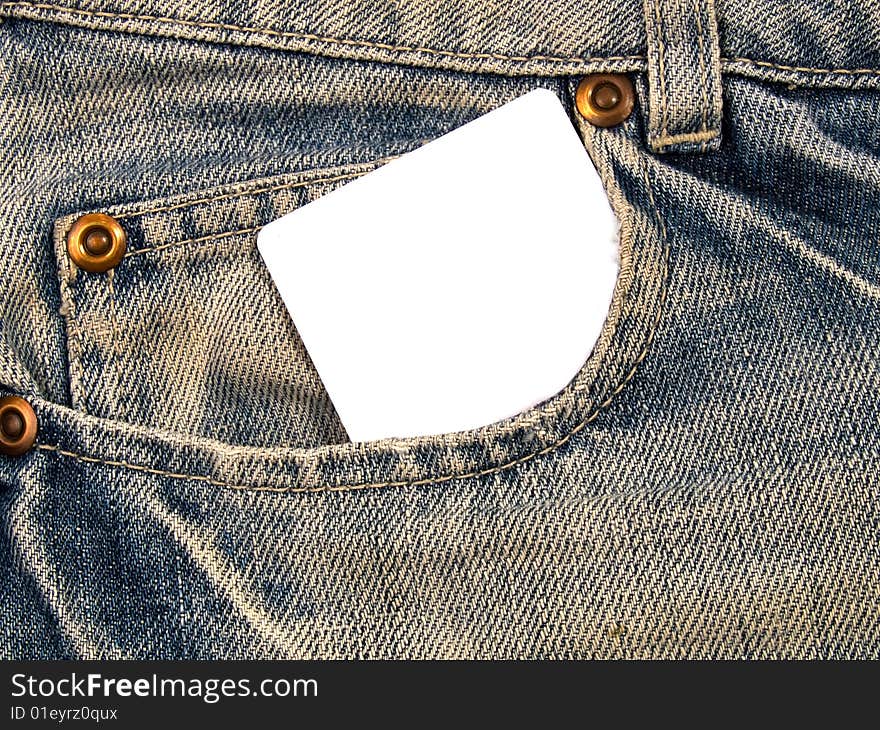 Denim pocket with a blank card, ready for your text. Denim pocket with a blank card, ready for your text