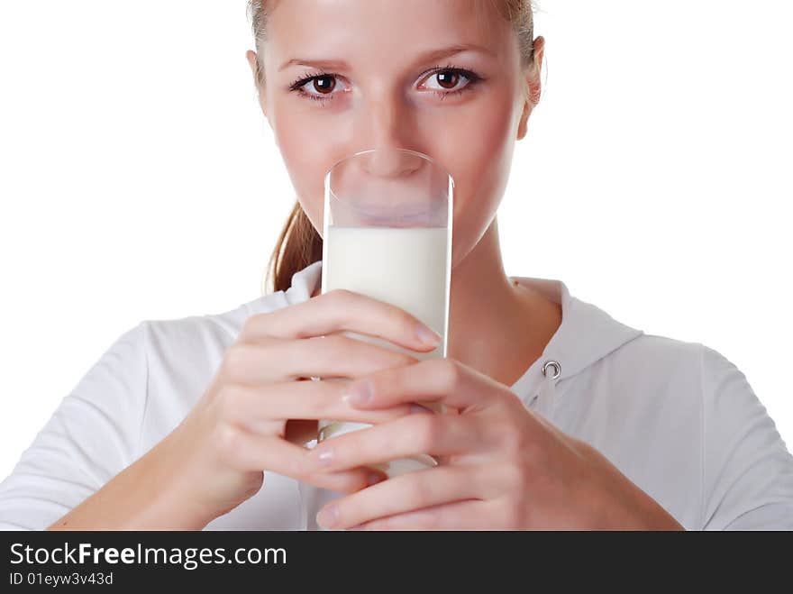 Young woman with glass of milk on white bacground