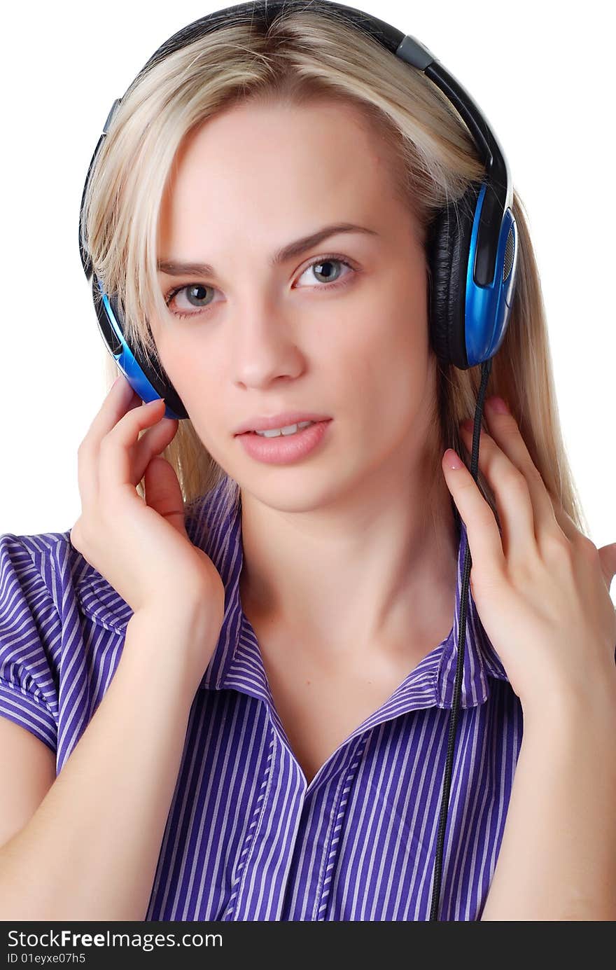 Young beautiful woman listening music with headpfones. Young beautiful woman listening music with headpfones