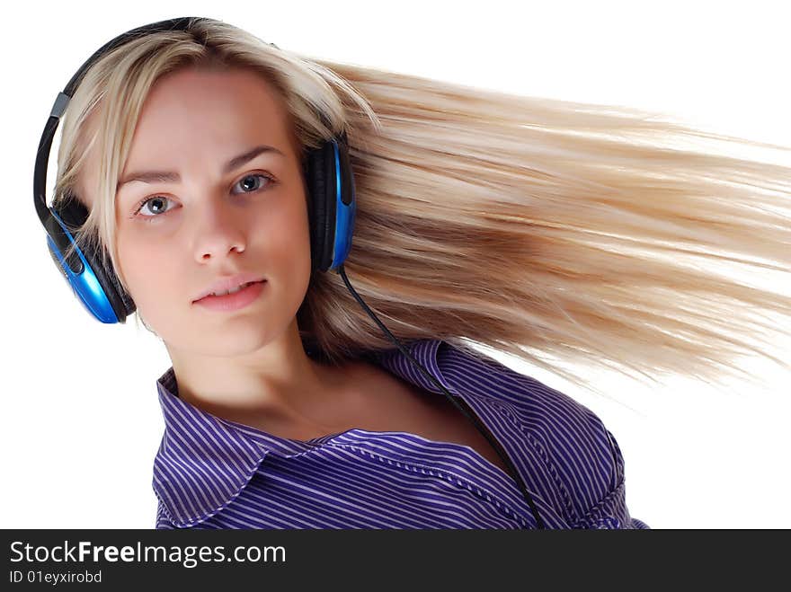 Young beautiful woman listening music with headpfones. Young beautiful woman listening music with headpfones