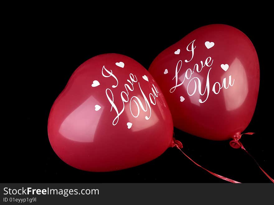 Valentine Heart shape Balloons on black background. With inscription I Love You. Valentine Heart shape Balloons on black background. With inscription I Love You.