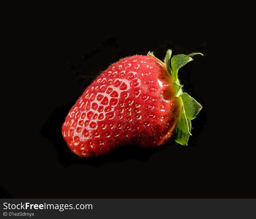 Fresh Strawberry on black ground