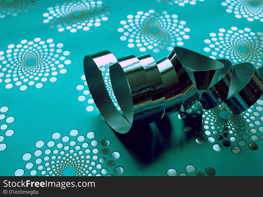 Blue wrapping paper with silver ribbon