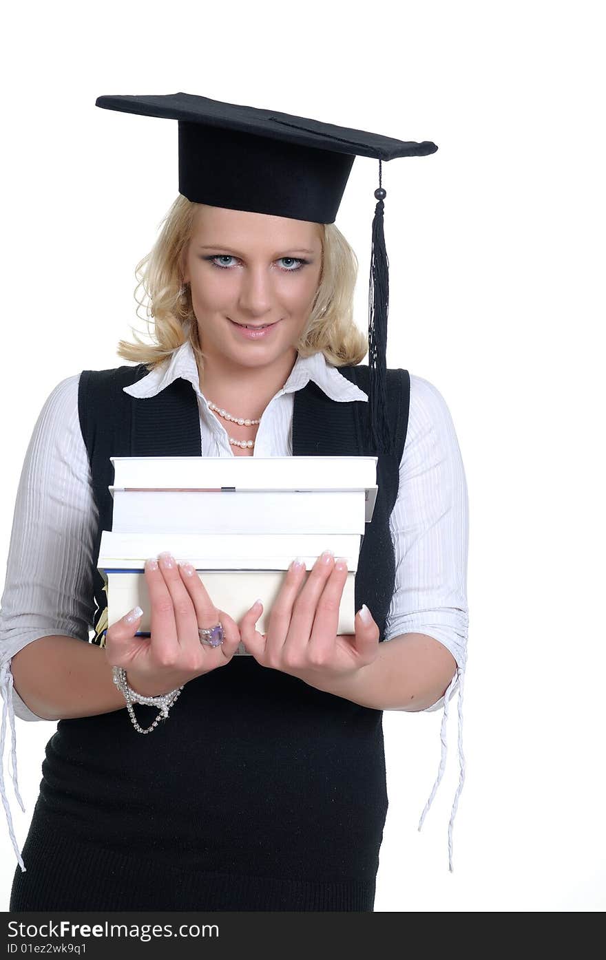 A happy woman with a motar board - maybe celebrating her sucessfull examination