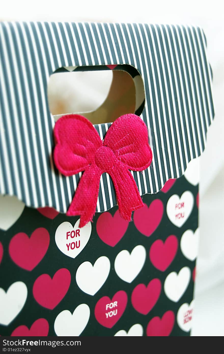 Gift box with hearts and bow. Gift box with hearts and bow