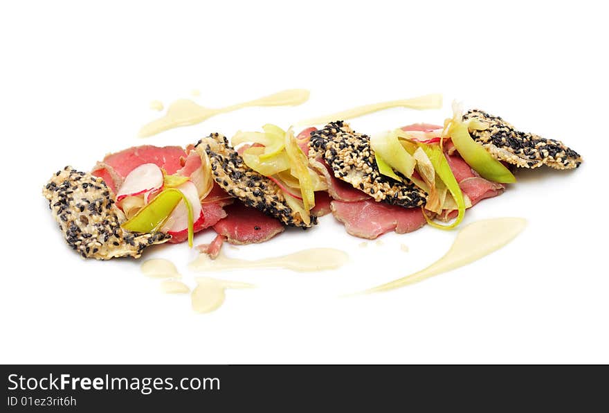 Veals Sashimi with Wasabi and Celery Chips over White Background