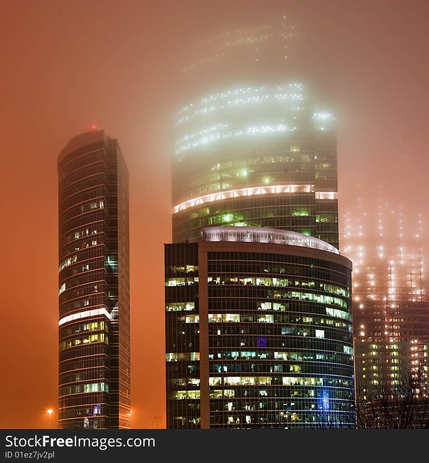 Scyscrapers In Mist At Night