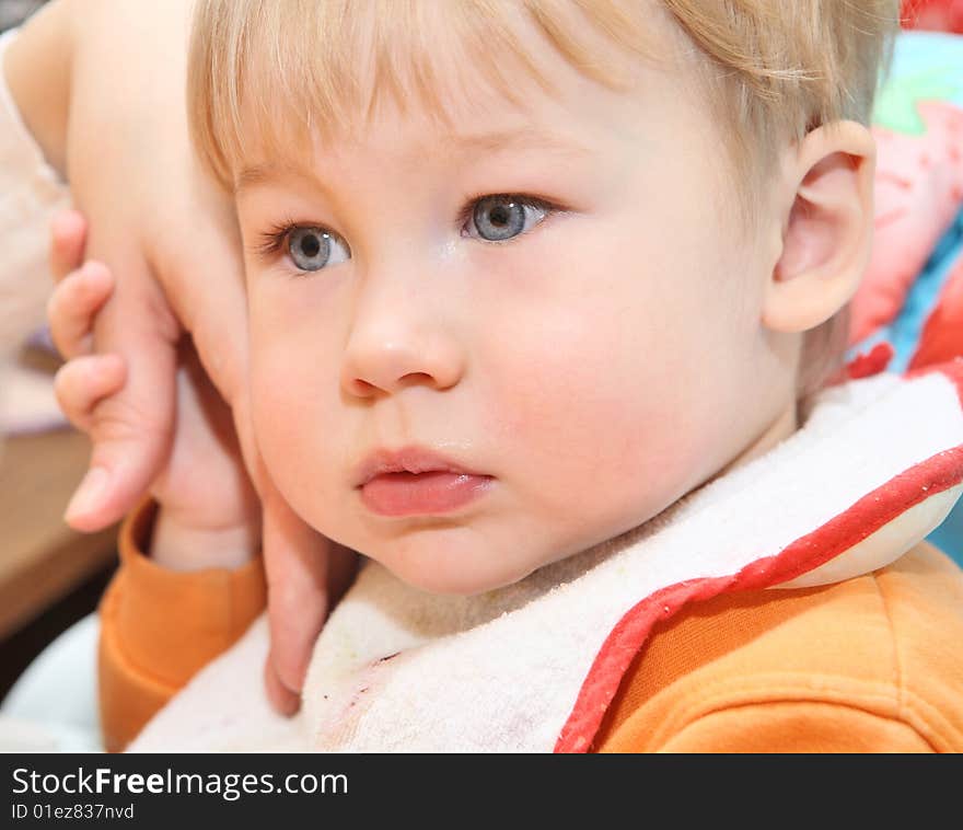 Cute boy holding mother s hand