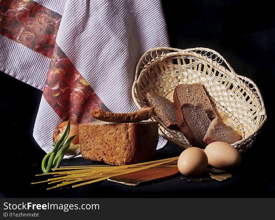 Still-life with bread, towel and onion