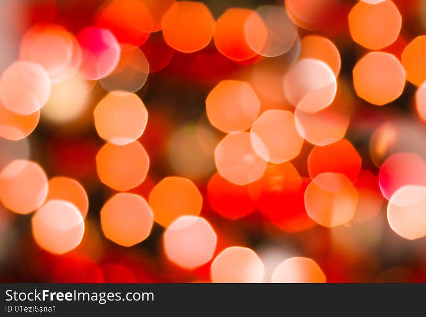 Abstract background of holiday lights. Red and yellow lights. Abstract background of holiday lights. Red and yellow lights.