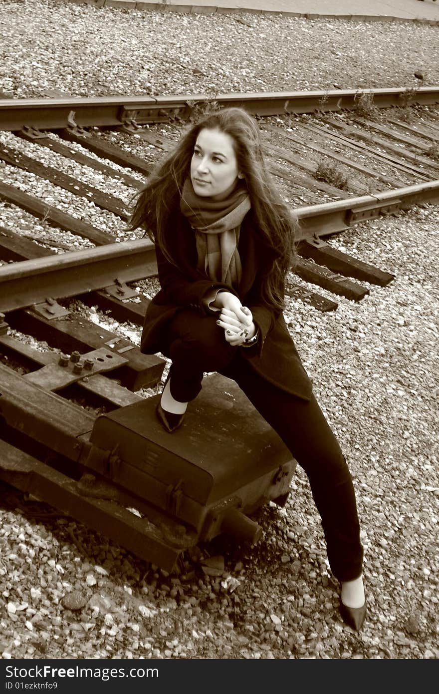 A girl near railroad