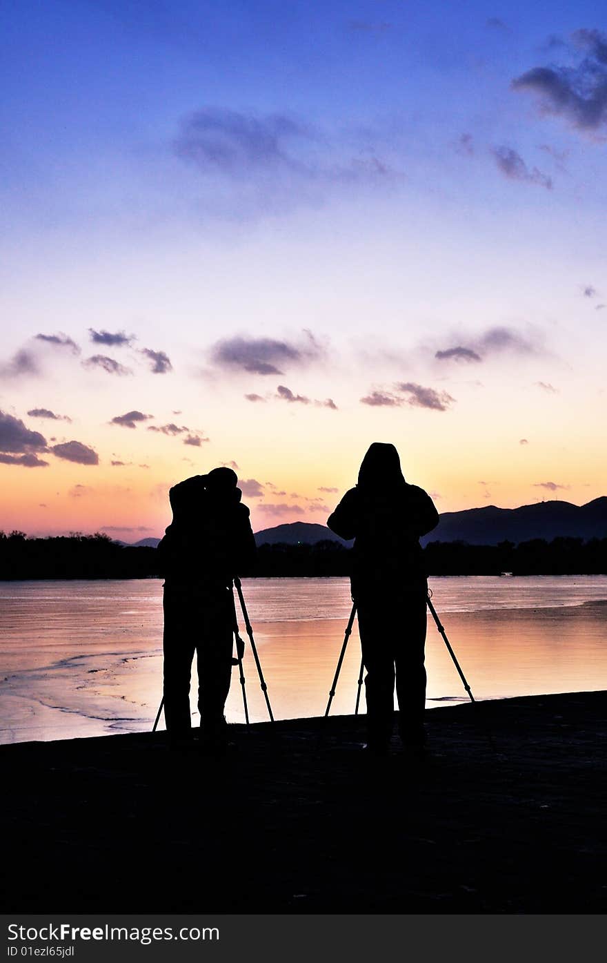 Photographer In Sunset