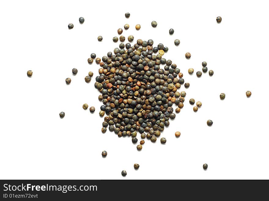 Black lentil isolated on white