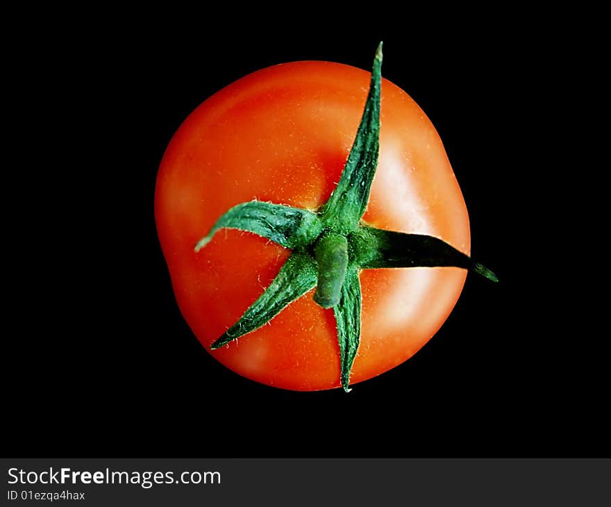 Fresh tomato on black background. Fresh tomato on black background.