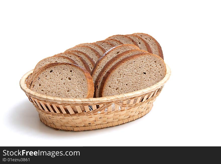 Pieces of bread in the basket isolated on a white background. Pieces of bread in the basket isolated on a white background.