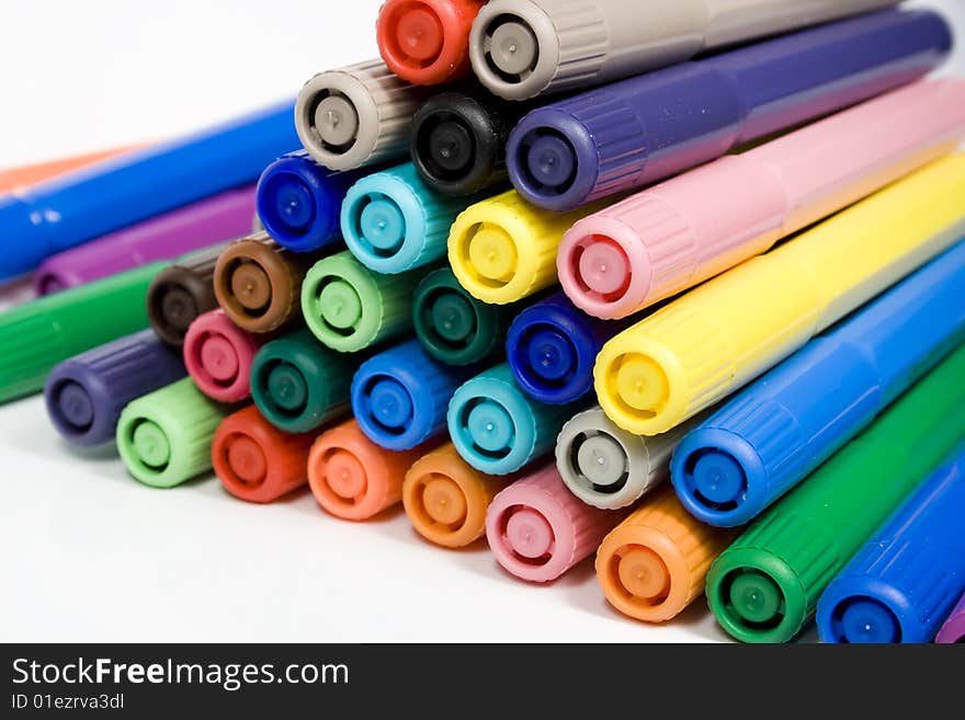 Many closed felt-tip pens, pastel and dark colors