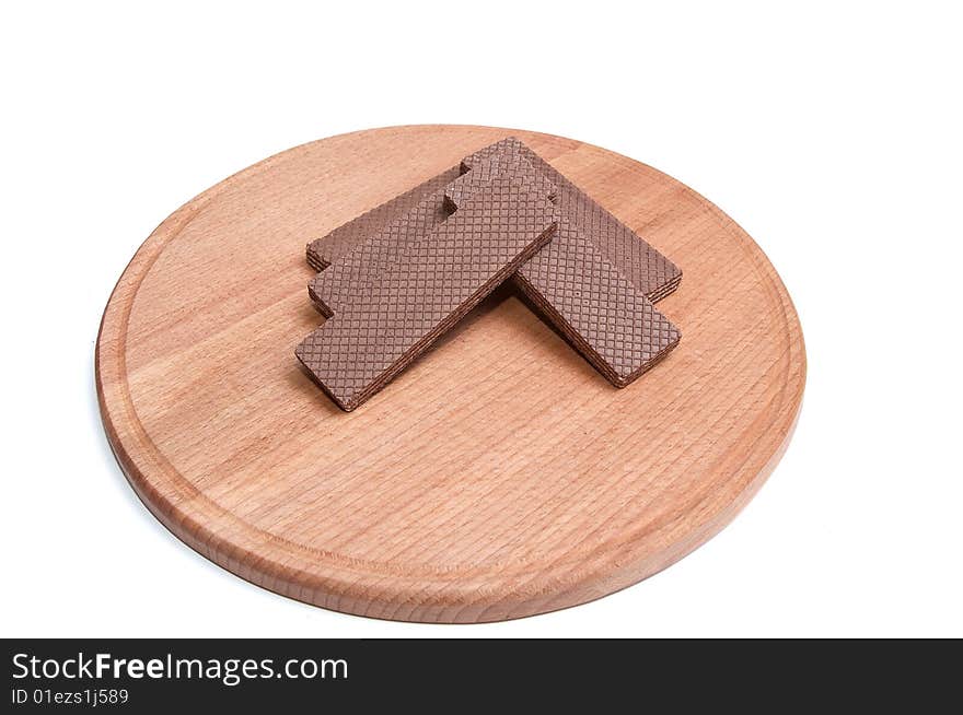 Wafers at the round board isolated on a white background. Wafers at the round board isolated on a white background.