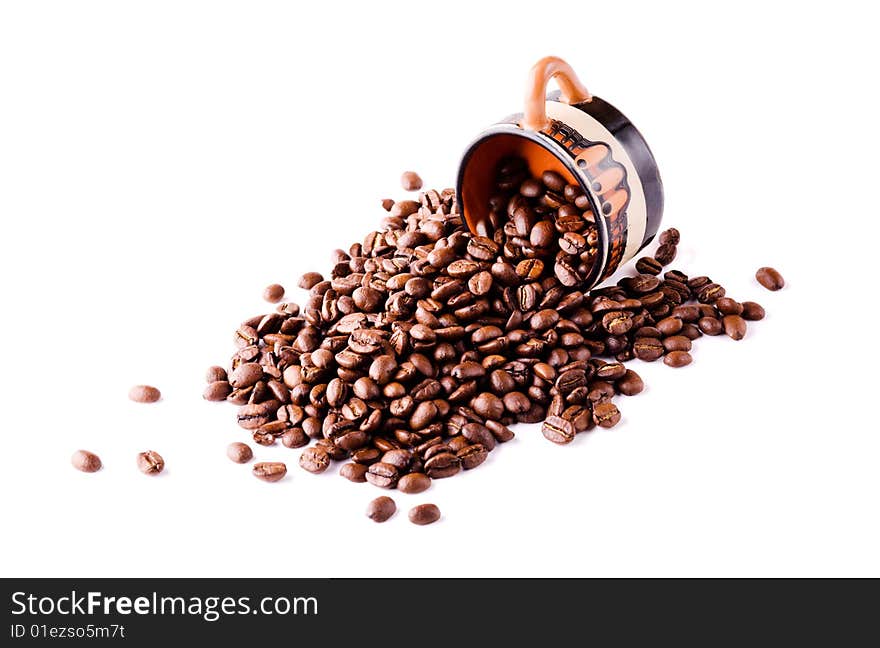 Pile Of Coffee Beans With A Cup