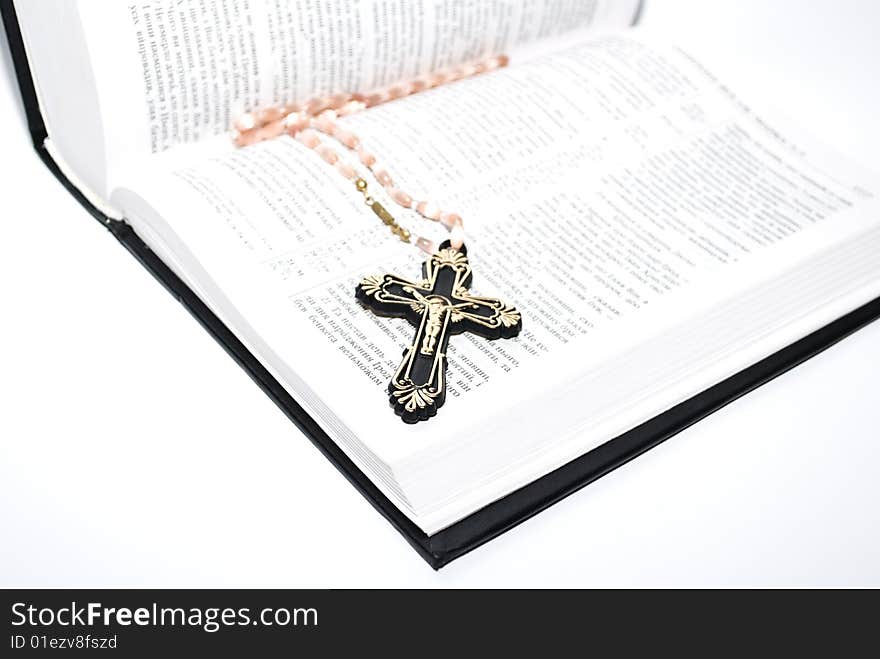 Religion concept.Book and cross