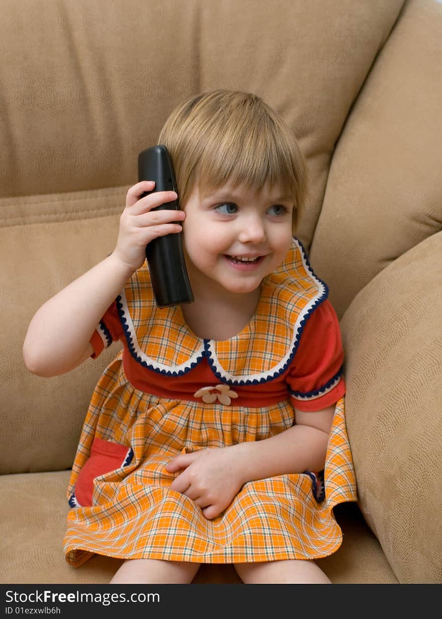 The little child with phone