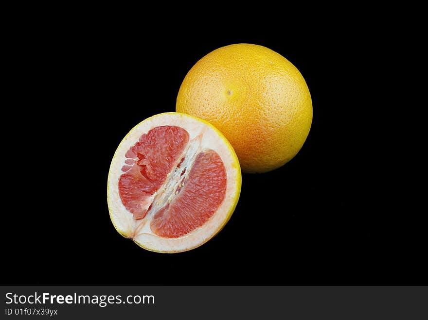 Orange fruit isolated on black