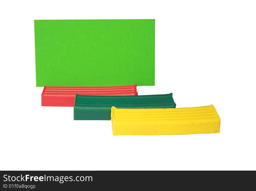 Card and plasticine on a white background. Card and plasticine on a white background